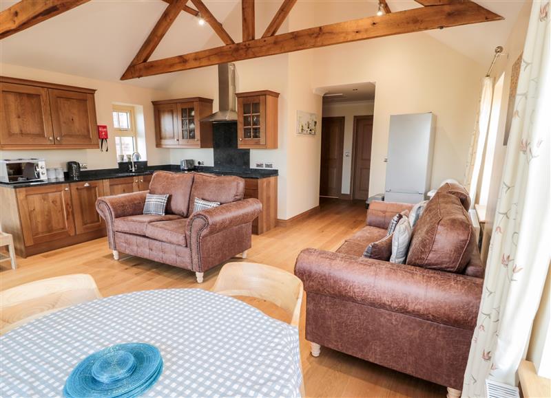 Relax in the living area at Bothy Cottage, Embleton