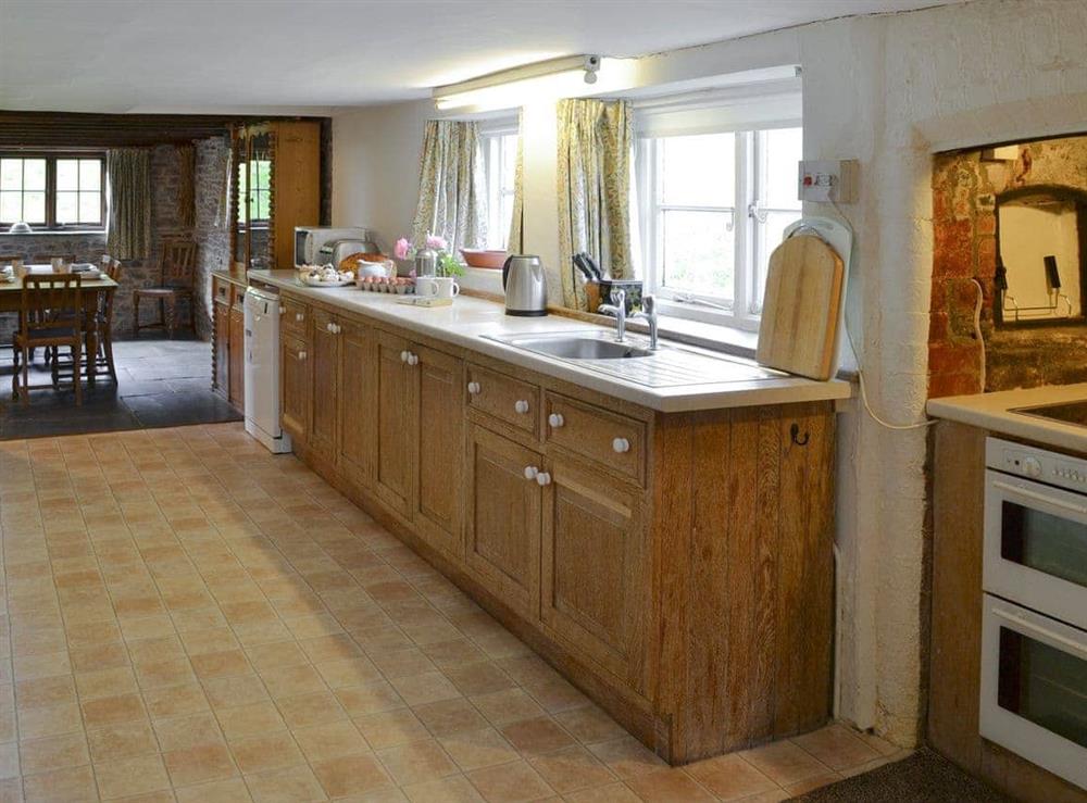 Well-equipped fitted kitchen at Boundstone Farmhouse in Littleham, near Bideford, Devon