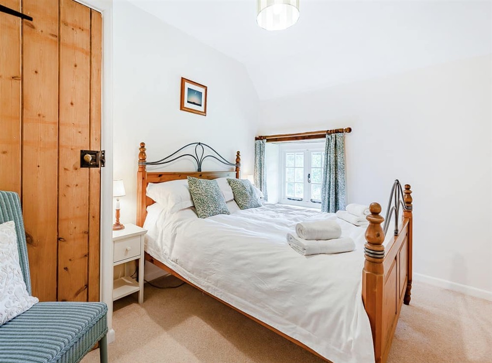 Double bedroom at Bourne Farm Cottage in Blandford Forum, Dorset