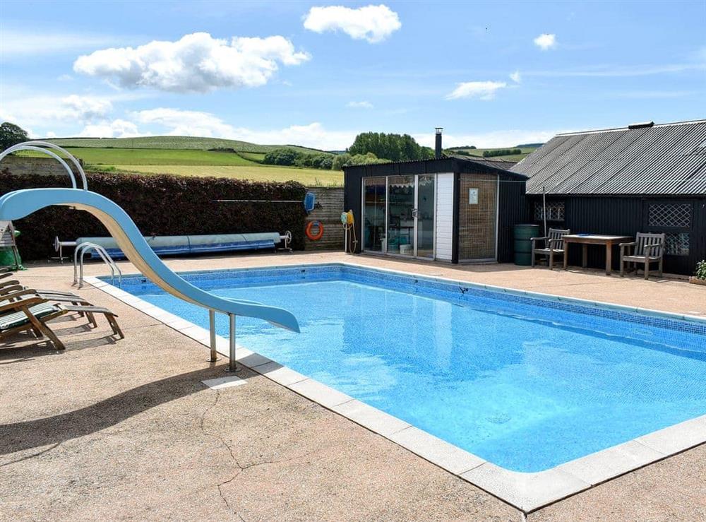 Heated outdoor swimming pool (photo 2) at Bournstream Cottage in Bilbrook, near Minehead, Somerset