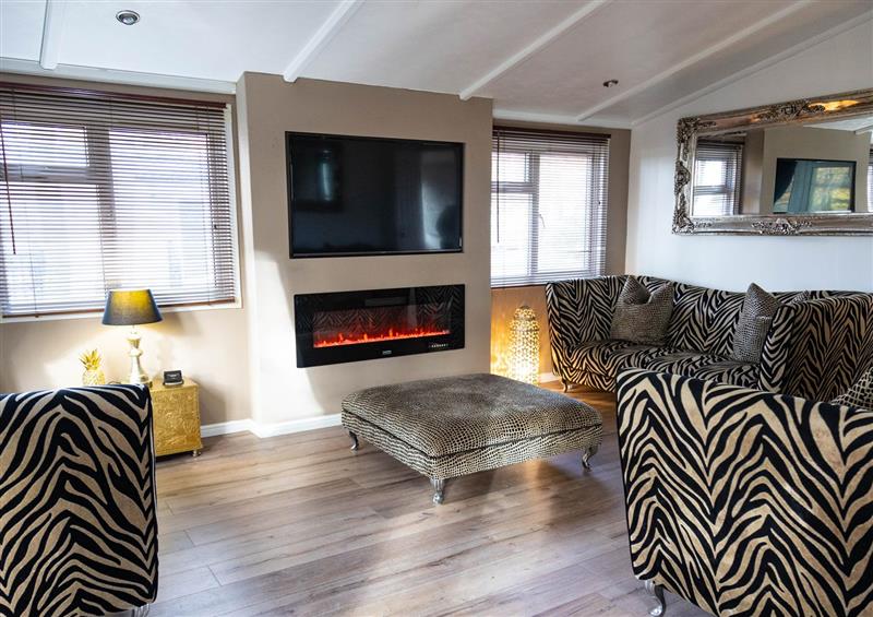 Relax in the living area at Boutique Lodge, Swarland