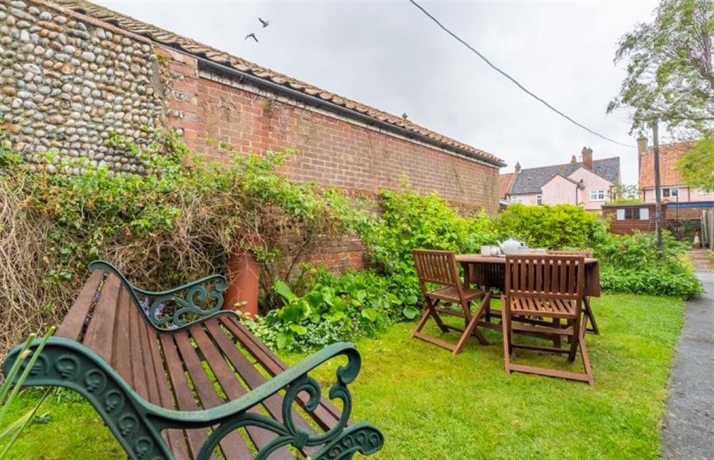 Rear garden with furniture at Bovis Cottage, Southwold