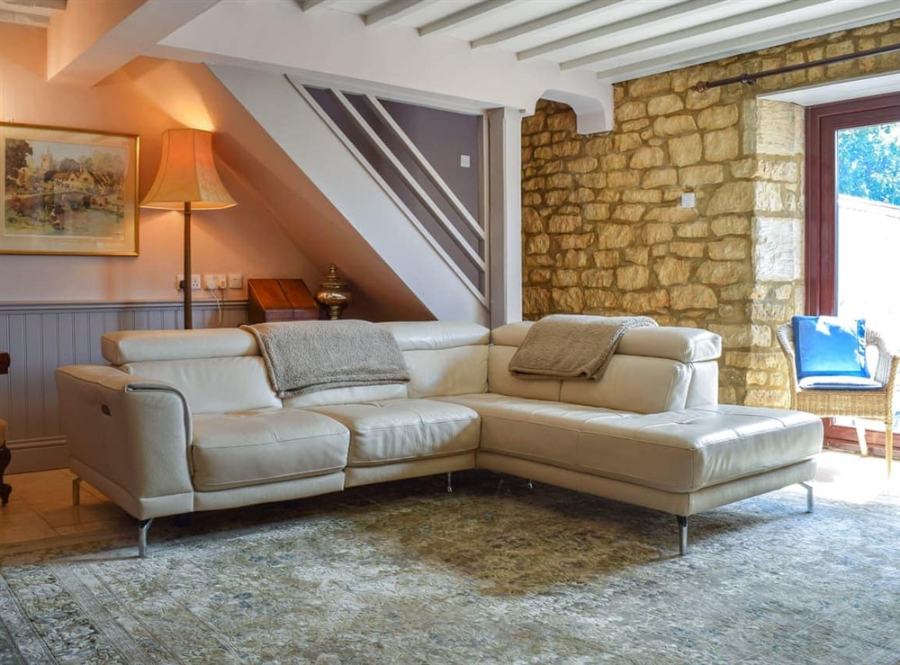 Living area at Bow Cottage in Bourton On The Water, Gloucestershire