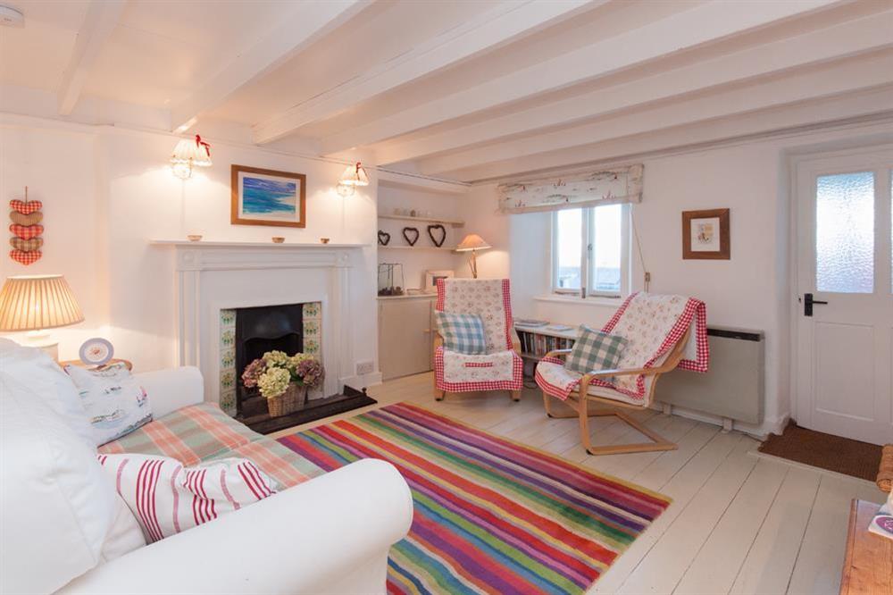Sitting room with open fire at Bow Cottage in , East Portlem'th, Salcombe
