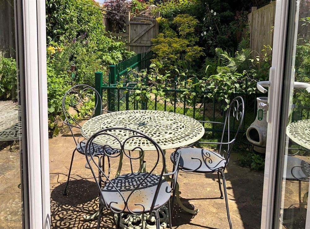 Patio with garden furniture at Bow Cottage in Fordwich, near Canterbury, Kent