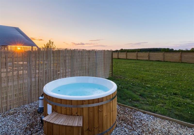 Hot tub in a lovely setting, Zebra Safari Tent at Bowbrook Lodges in Pershore, Worcestershire
