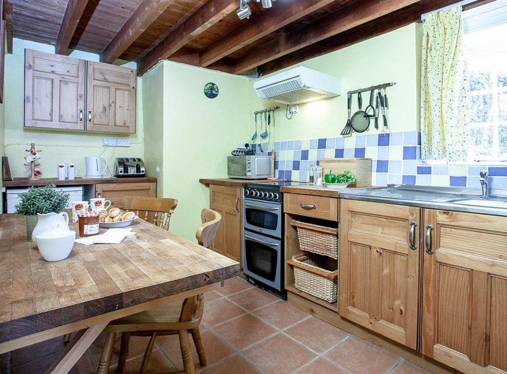 Kitchen/diner at Bowjy Cottage in Cubert, Newquay, Cornwall