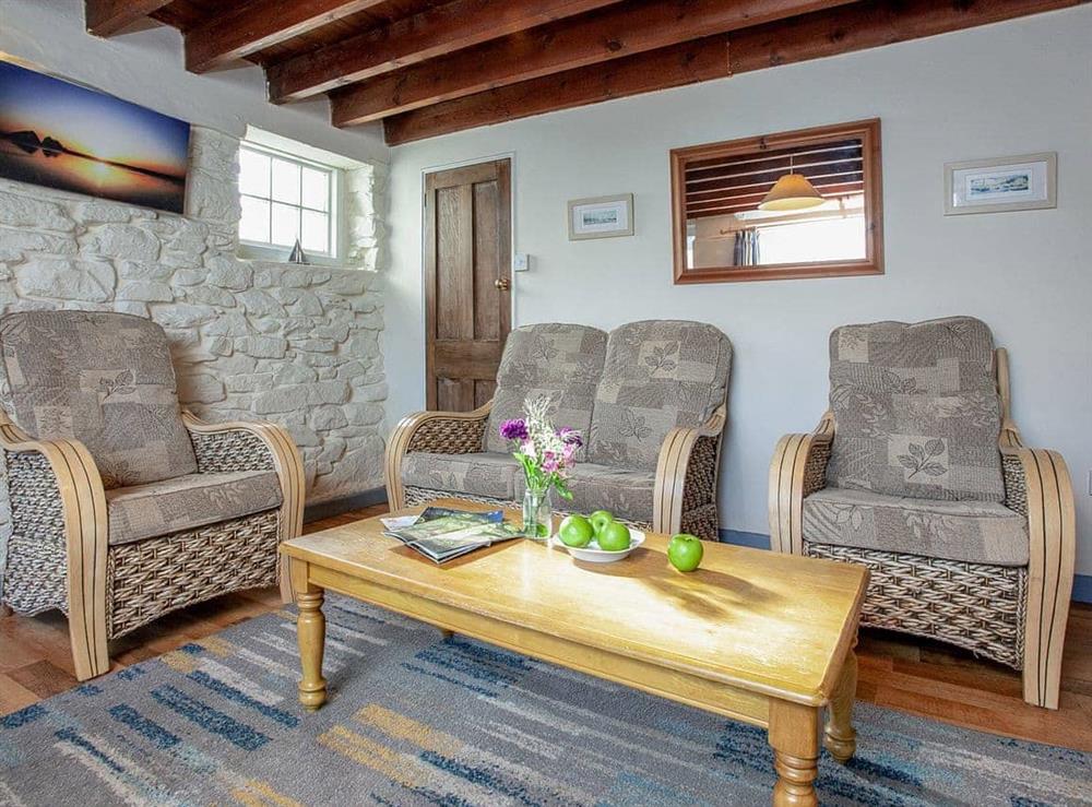 Living area at Bowjy Cottage in Cubert, Newquay, Cornwall