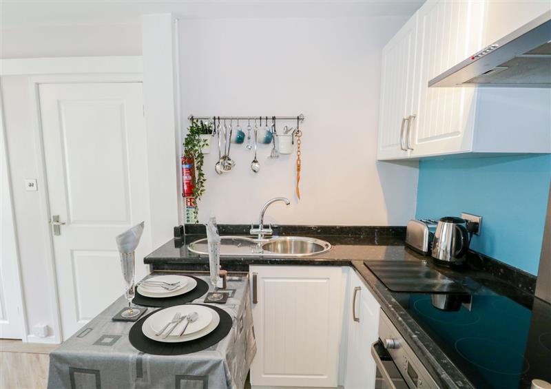This is the kitchen at Bowness Hideaway, Bowness-On-Windermere