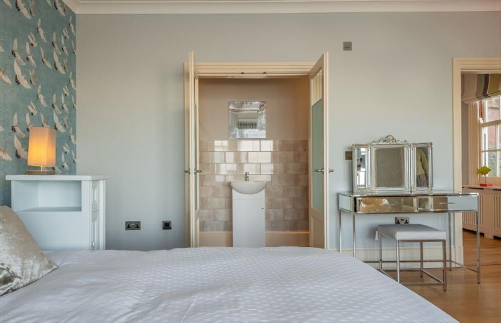 First floor: Master bedroom with discreet en-suite at Boycott House, Cromer