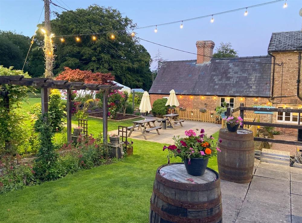 Beer garden of the cottage owners adjoining pub/restaurant at Boyne Arms Cottage in Burwarton, near Bridgnorth, Shropshire