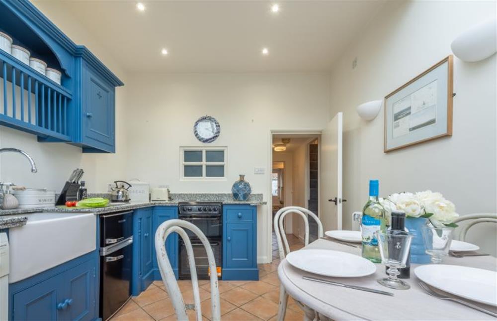 Ground floor: Kitchen with dining table seating four at Bracken Cottage, Brancaster Staithe near Kings Lynn