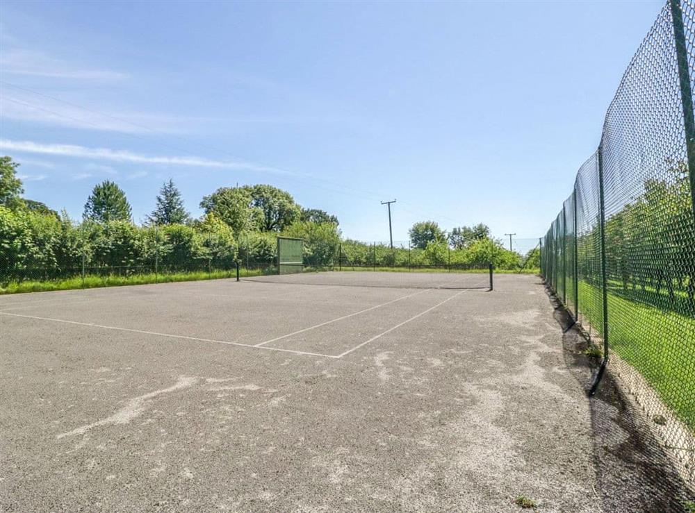 Tennis court at Braeburn in Pilton, near Shepton Mallet, Somerset