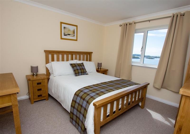 A bedroom in Braemore Cottage at Braemore Cottage, Kyles of Scalpay near Tarbert