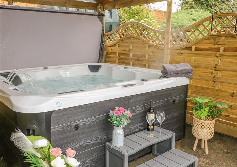 There is a hot tub at Braeside Farm House, Cloughmills
