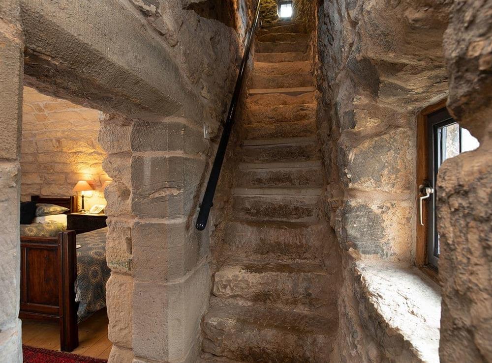 Narrow stone stairs connect the castle’s many floors at Braidwood Castle, 
