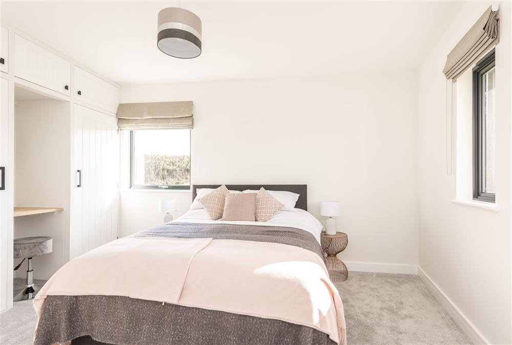 Bedroom one:  With a 5ft king-size bed and en-suite bathroom at Bramble, Ansty, Dorchester