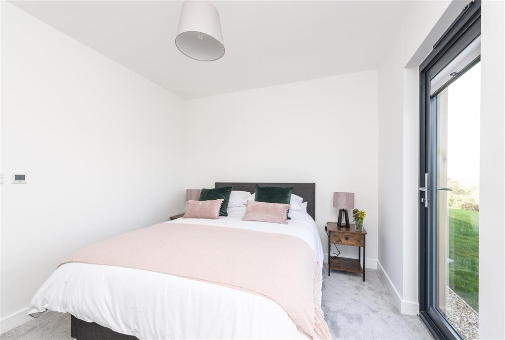Bedroom two: With a 5ft king-size bed and en-suite bathroom at Bramble, Ansty, Dorchester