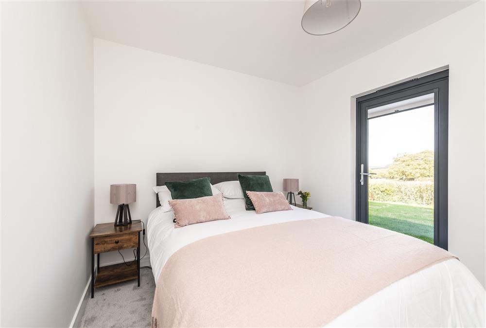 Bedroom two: With a 5ft king-size bed and en-suite shower room at Bramble, Ansty, Dorchester