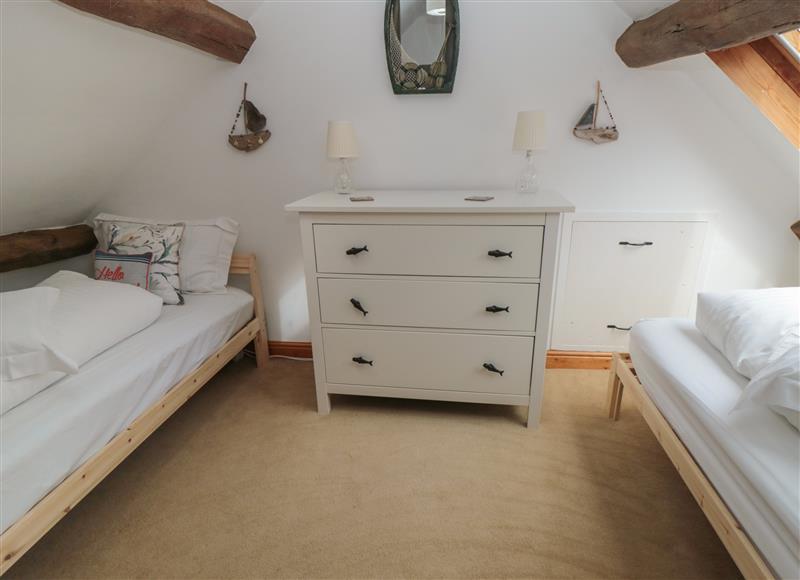 A bedroom in Bramble Corner Cottage at Bramble Corner Cottage, Staithes