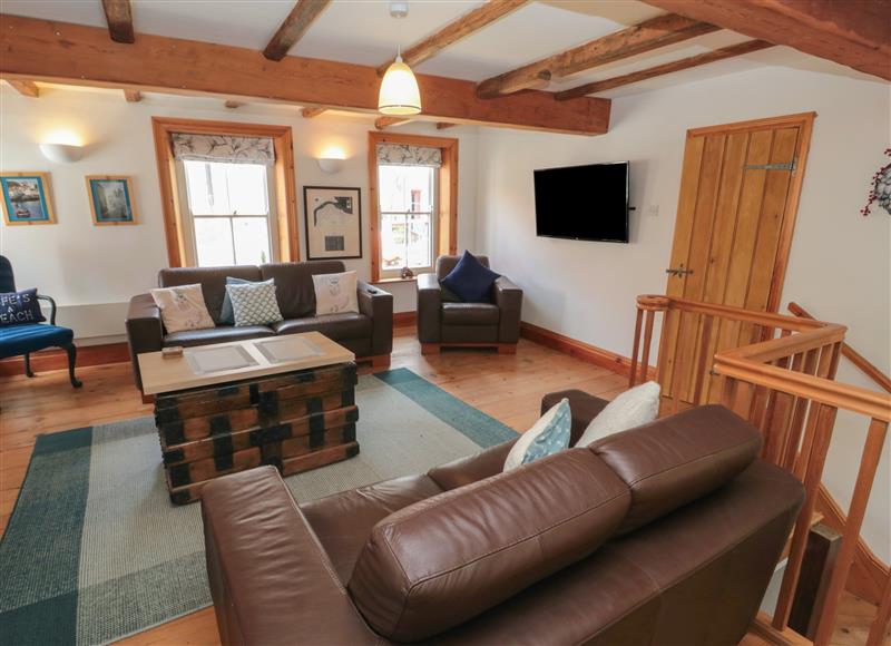 Relax in the living area at Bramble Corner Cottage, Staithes