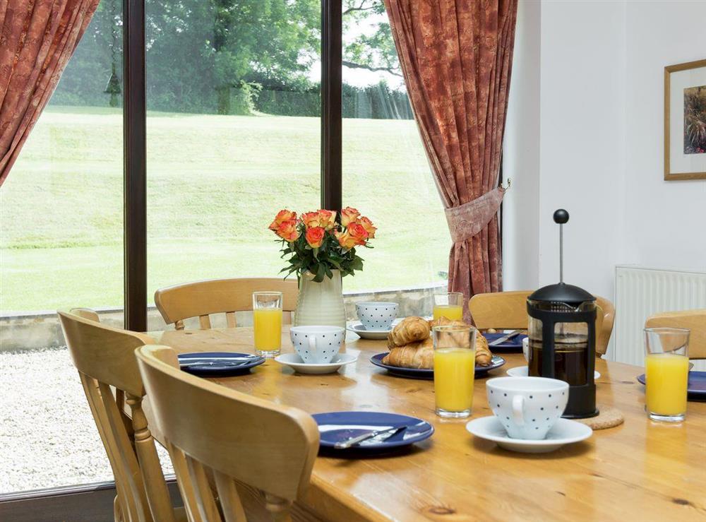 Airy dining space at Bramble Cottage in Foxcote, near Radstock, Avon