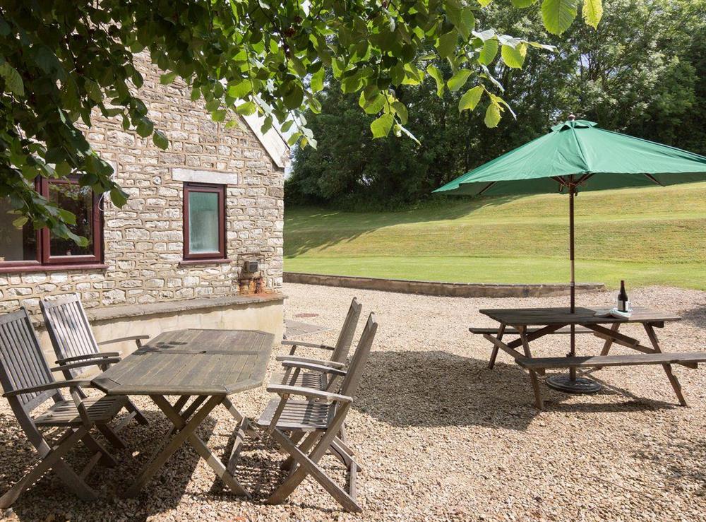 Ample outdoor seating at Bramble Cottage in Foxcote, near Radstock, Avon