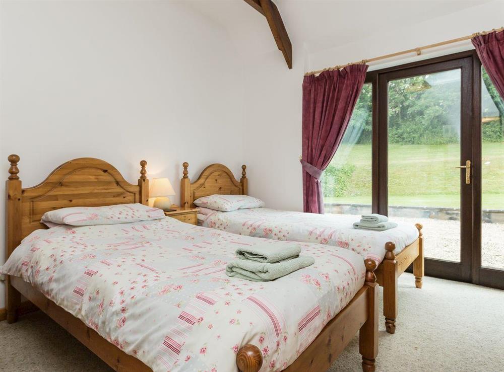 Light and airy twin bedroom at Bramble Cottage in Foxcote, near Radstock, Avon