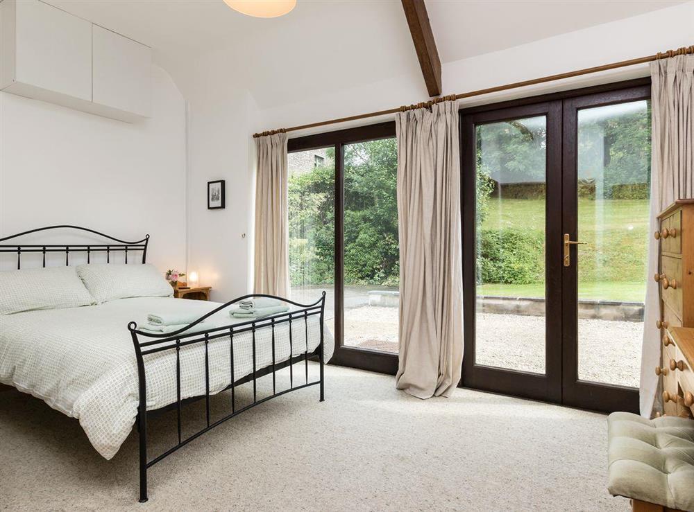 Spacious master bedroom at Bramble Cottage in Foxcote, near Radstock, Avon