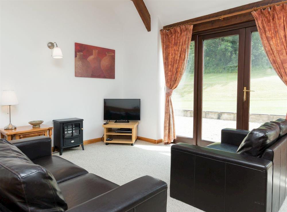 Stylish lounge area at Bramble Cottage in Foxcote, near Radstock, Avon