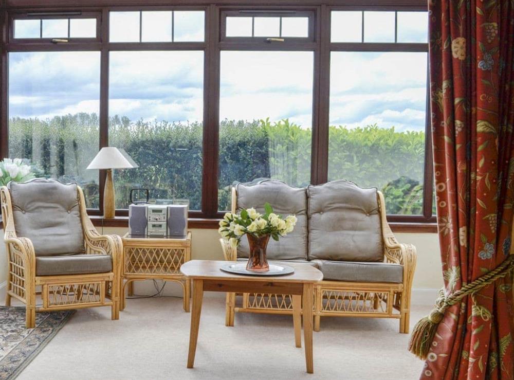 Sunny and airy conservatory at Bramble Cottage in Meigle, Perthshire