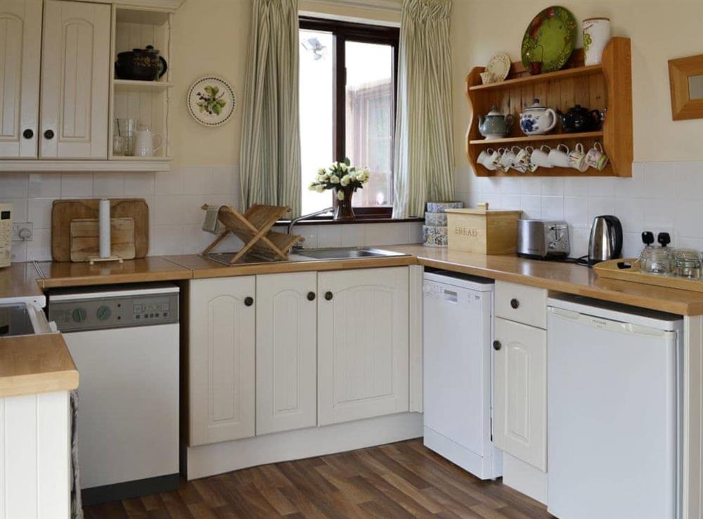 Well fitted and well-equipped kitchen at Bramble Cottage in Meigle, Perthshire