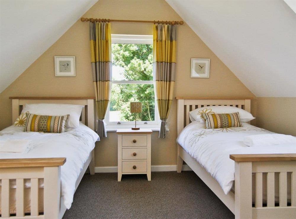 Twin bedroom at Bramble Cottage in Wimborne, Dorset