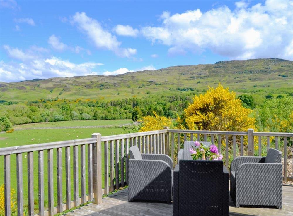 Seating area with wonderful views across the fields towards Loch Ness at Bramble Lodge in Fort Augustus, Inverness-Shire