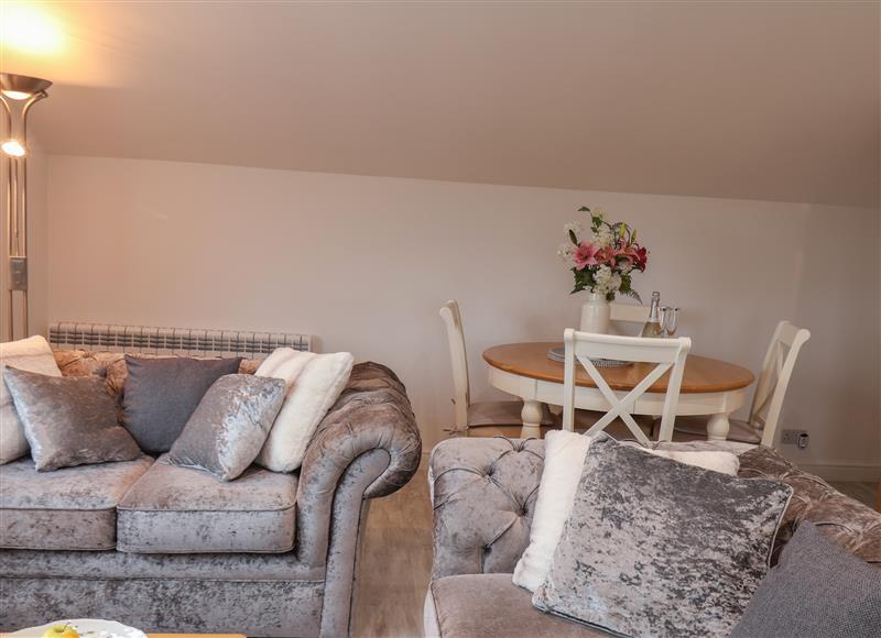 Relax in the living area at Brambles Apartment, Sneatonthorpe near Ruswarp
