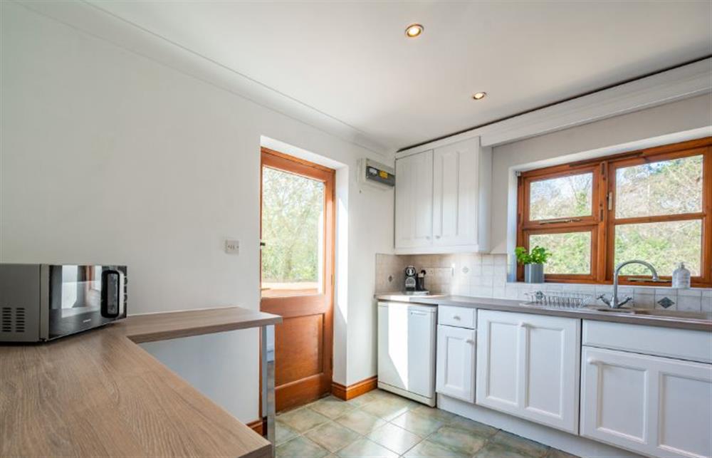 Ground floor: Kitchen with side door to the garden at Brambles, Brancaster Staithe near Kings Lynn