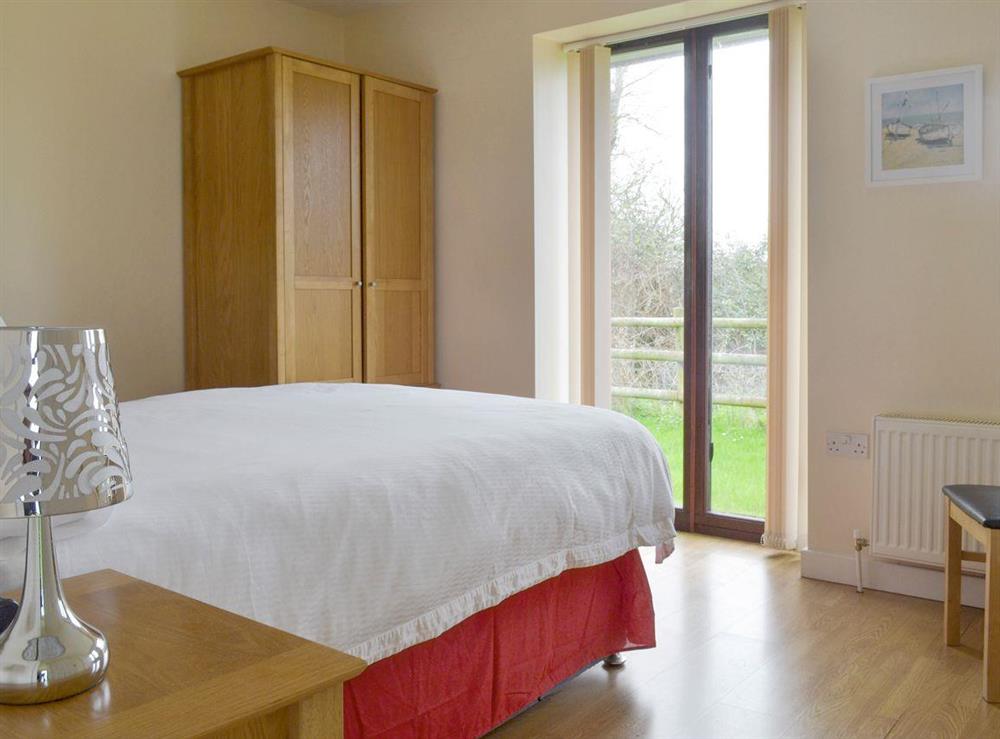 Ample storage within double bedroom at Bramley Cottage in Lympsham, near Weston-super-Mare, Somerset, England