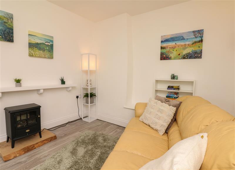 Relax in the living area at Bramley Cottage, Whimple