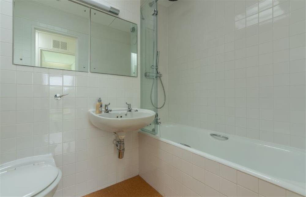 Bathroom: with bath with rainfall shower over and separate hand held attachment at Bramley, Old Hunstanton