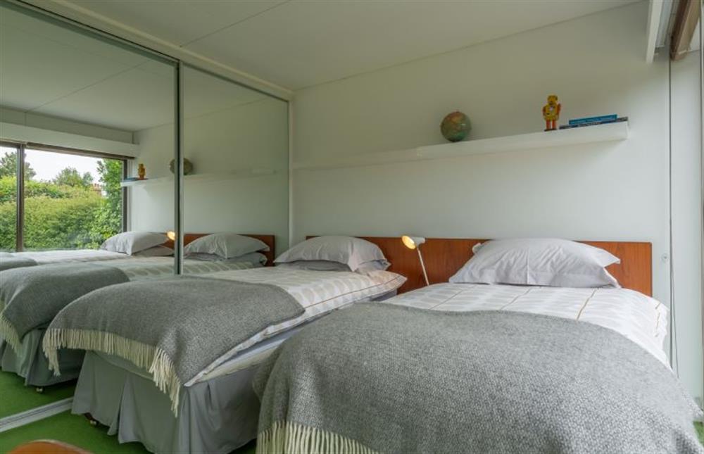 Bedroom two: with full-size twin beds and built in wardrobe at Bramley, Old Hunstanton
