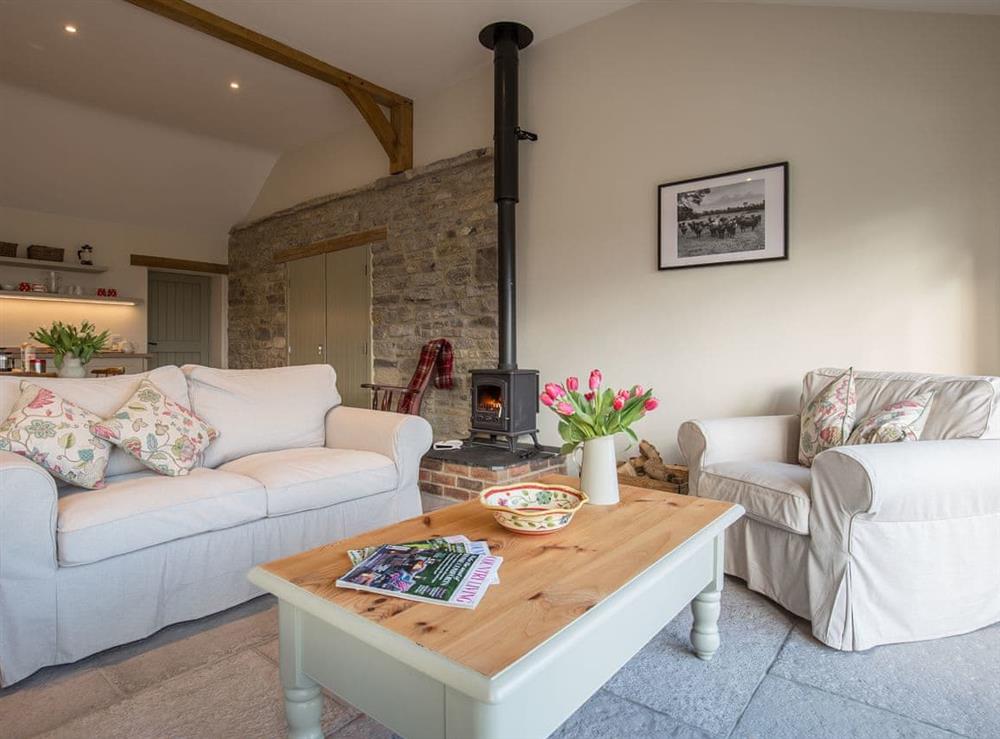 Thoughtfully furnished open plan living space at Square Barn, 
