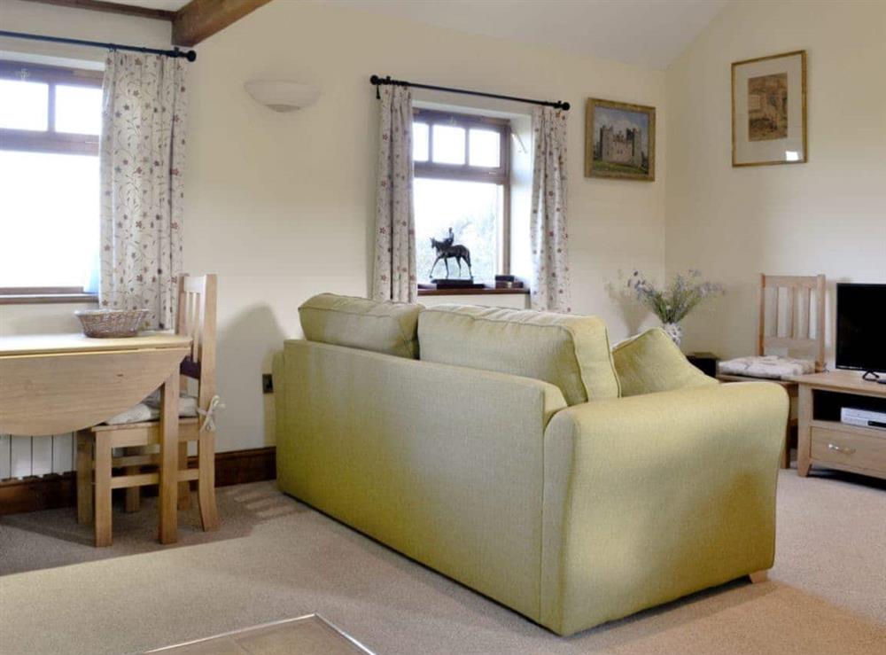 Comfortable living/ dining area at Brandys Barn in Middleham, near Leyburn, North Yorkshire