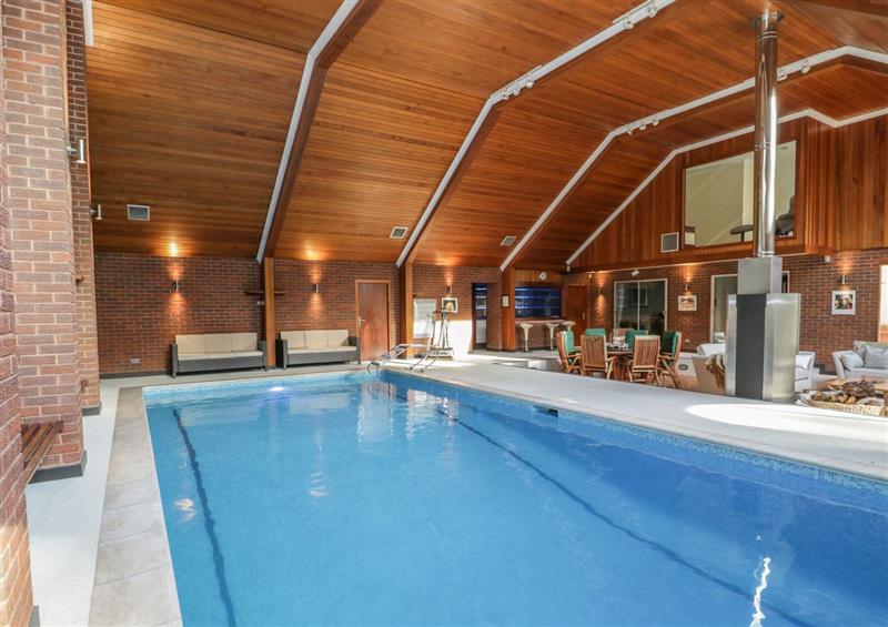 Enjoy the swimming pool at Branksome Wood House, Poole