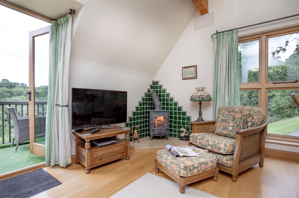 Cosy up by the wood burning stove during the cooler evenings