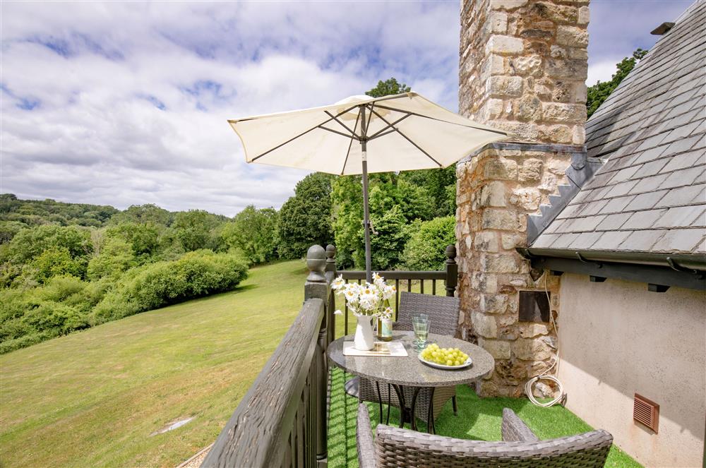 The balcony area leads off the sitting room, the perfect spot for alfresco dining