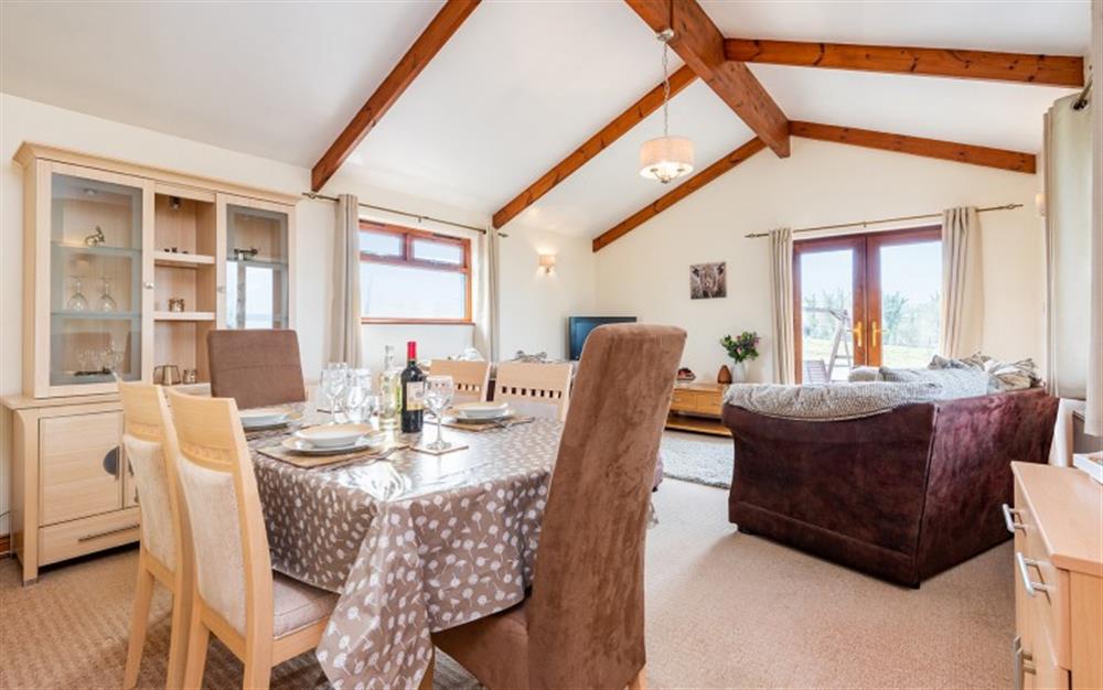 The bright and comfortable living/dining room at Bravery Cottage Barn in St Tudy