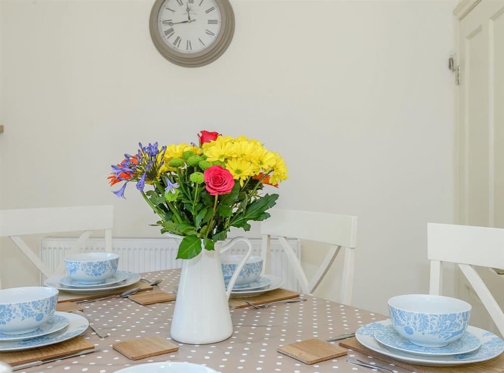 Charming dining area at Woodcutters Cottage, 