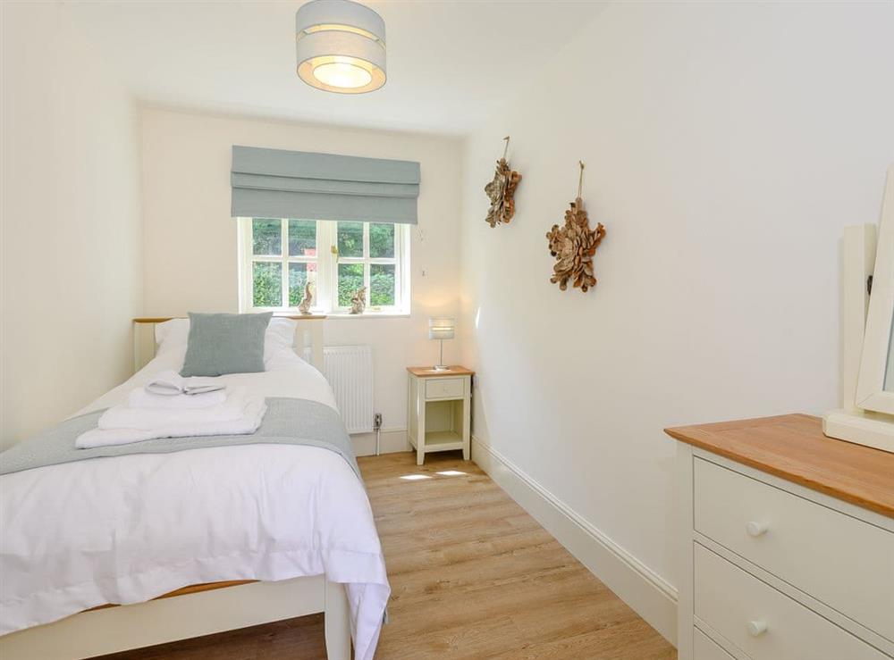 Comfortable single bedroom at Woodcutters Cottage, 