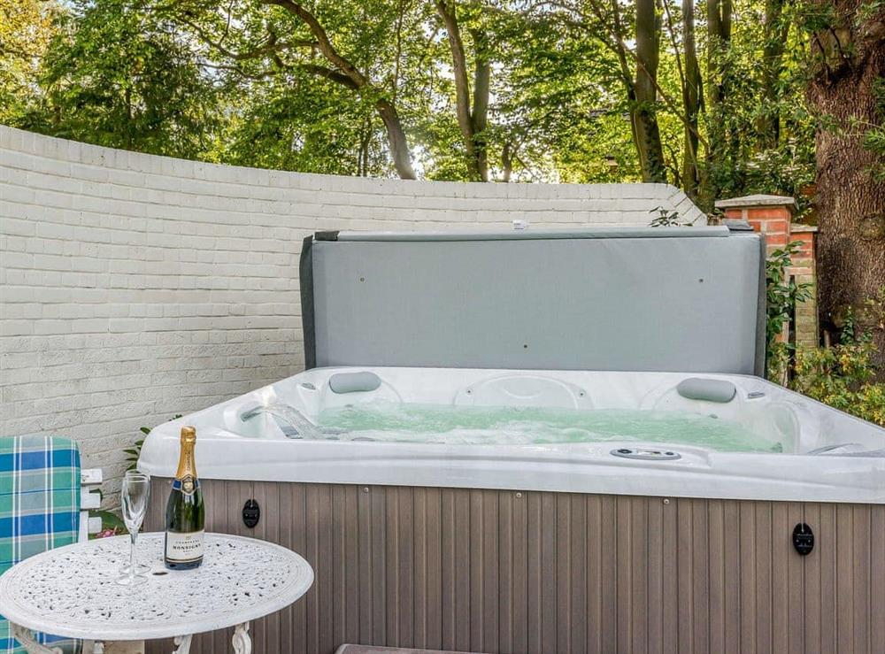 Relaxing hot tub at Braydeston House in Brundall, near Norwich, Norfolk