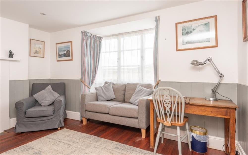 Relax in the living area at Breakwater Cottage in Bude